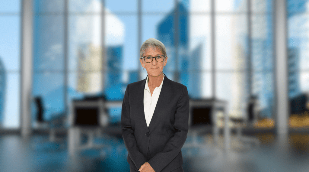 Article cover image for Brondwen MacLean's 'working with boards' Q&A, displaying Brondwen's corporate headshot in front of a blurred boardroom